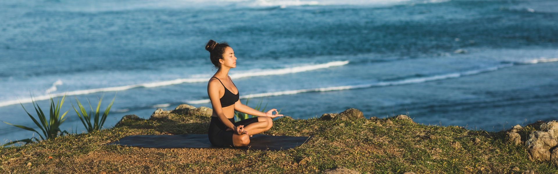 Woman Practicing Yoga And Sitting In Lotus Pose Ou 2021 08 30 07 43 23 Utc
